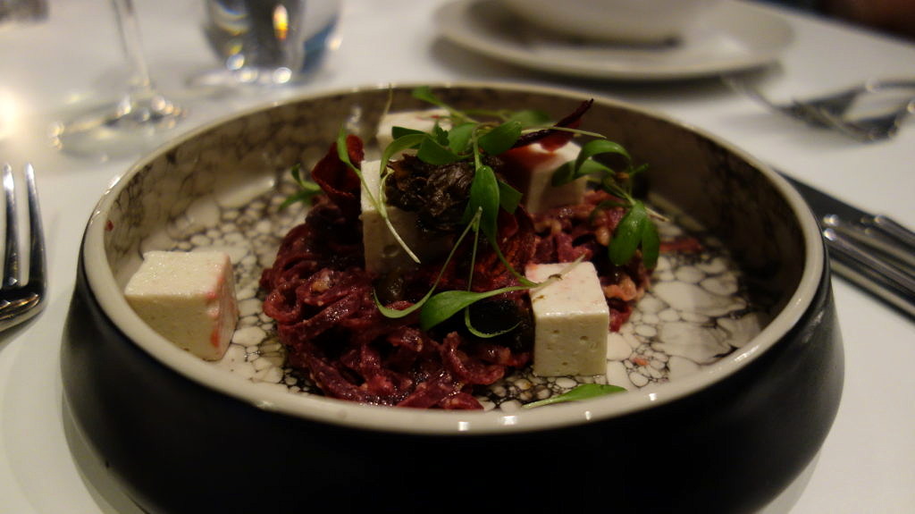 Beetroot spaghetti, homemade vegan feta cheese, hummus dressing 